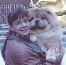 Amy Young hugging one of her champion Chow Chows in New York City